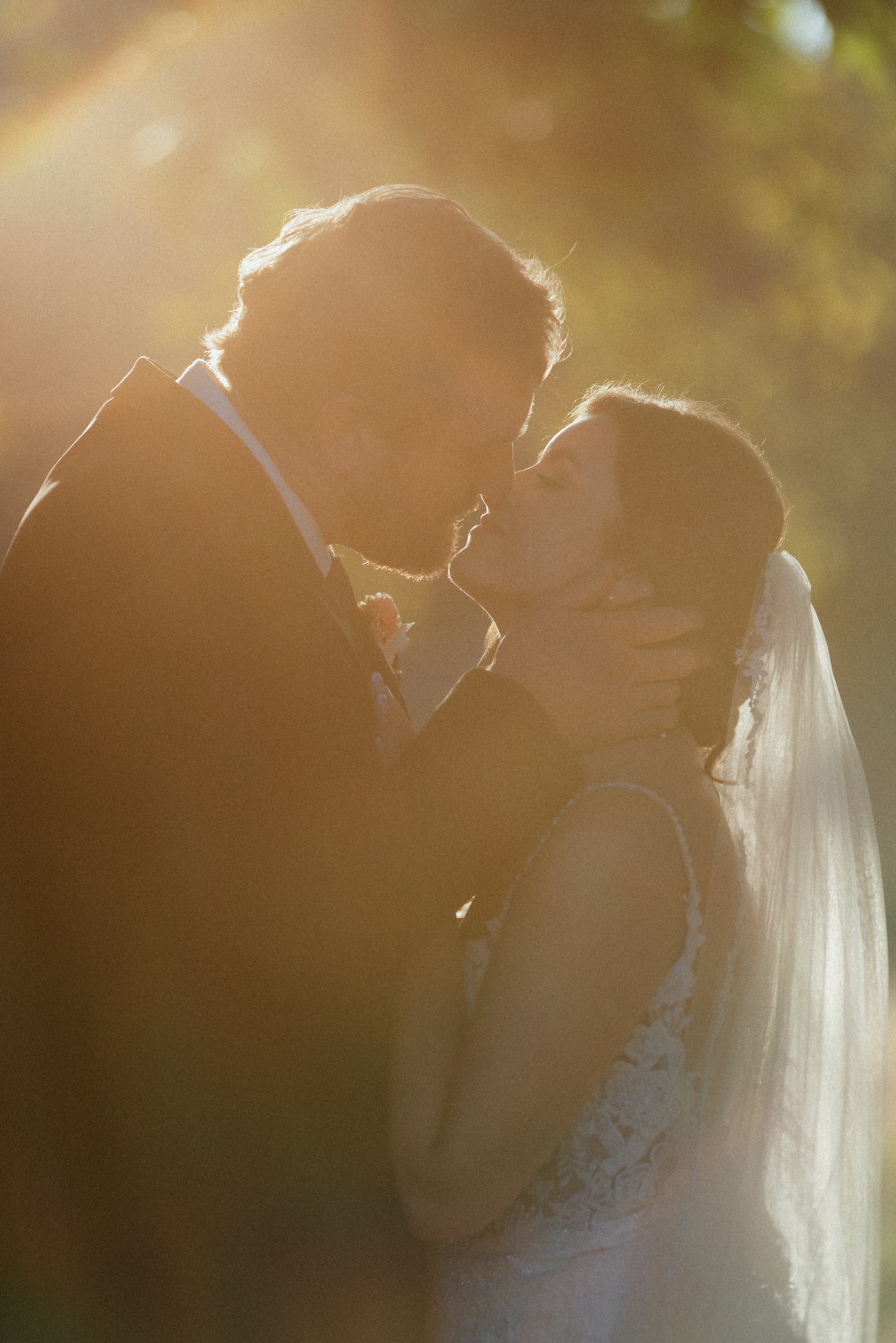 A bride and groom kissing